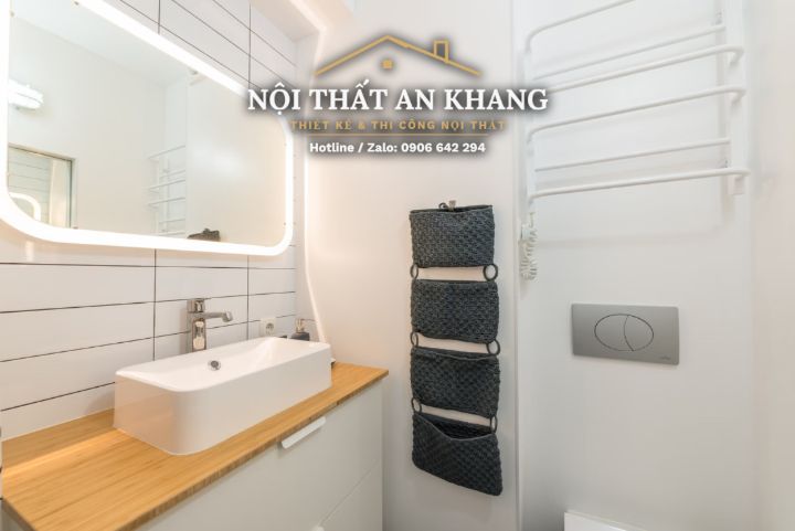 Căn hộ studio Japandi gỗ vàng – khách, bếp, bàn làm việc, phòng tắm – góc 17