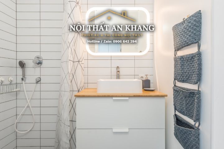 Căn hộ studio Japandi gỗ vàng – khách, bếp, bàn làm việc, phòng tắm – góc 20